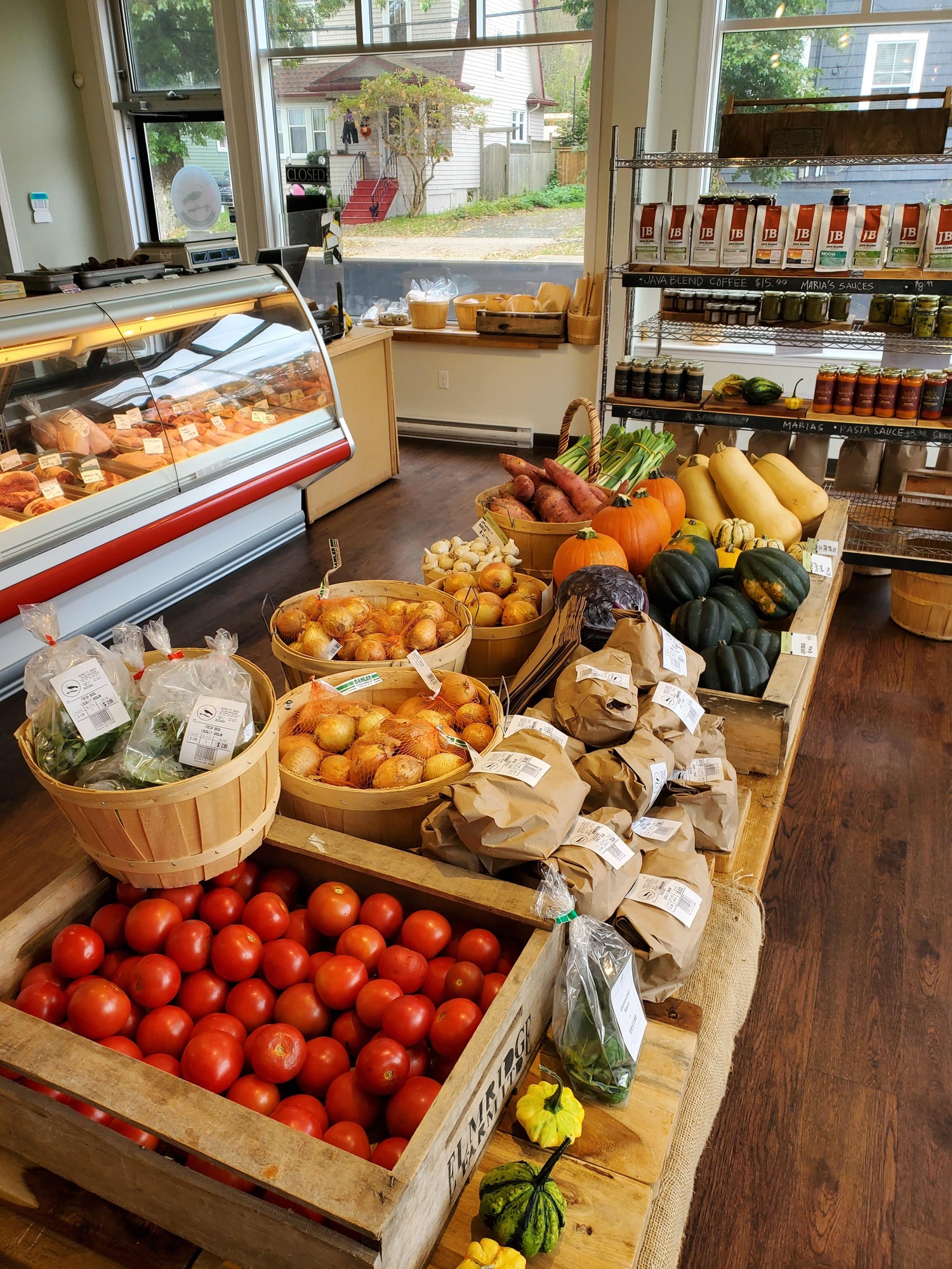Tables filled with fresh local fruits and vegetables